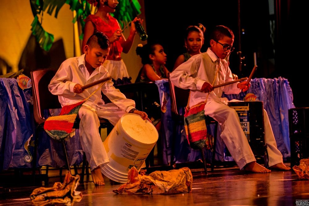 Musicians with traditional drums on stage